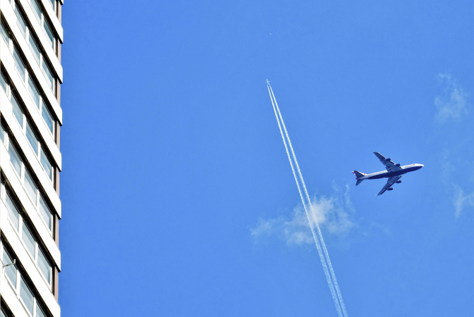 Airplanes leaving vapour trails contributing to a warmer plant
