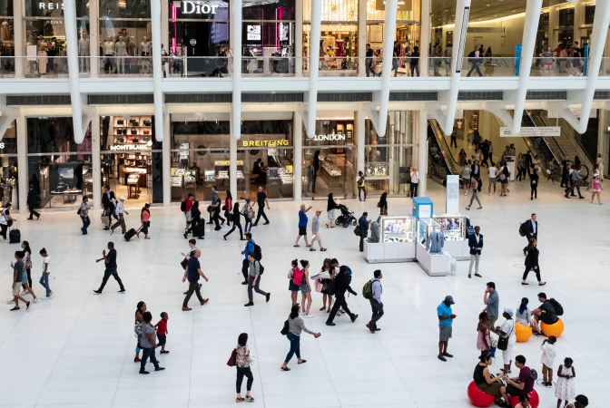 A busy mall full of people shopping