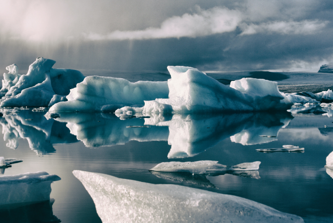 Icebergs with clouds in the background