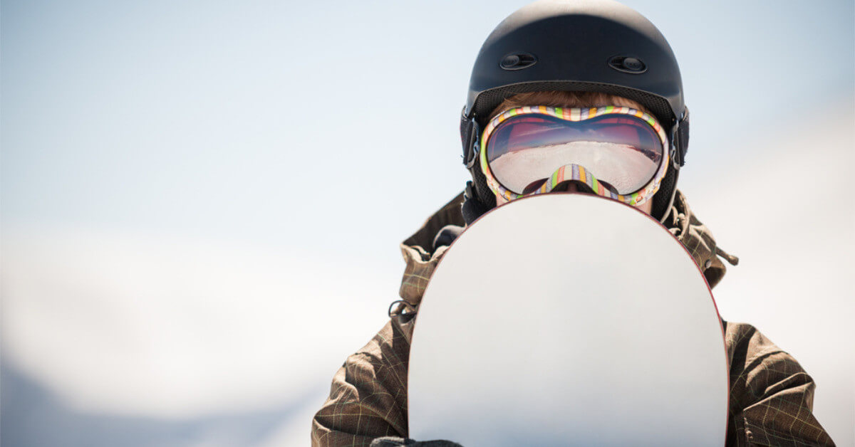 Snowboarders Wear Goggles Under Helmets 