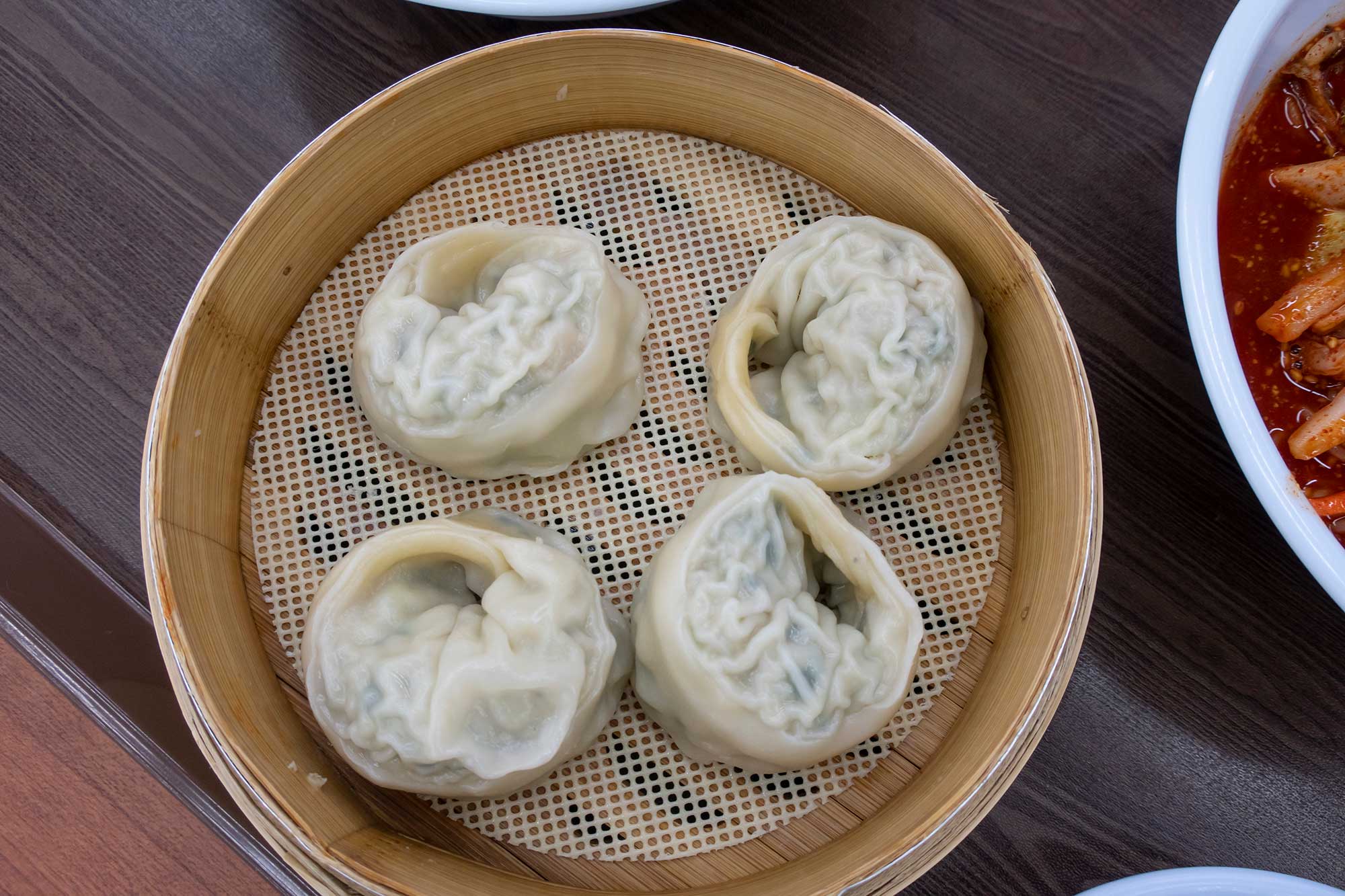 Korean dumplings in a wooden bowl