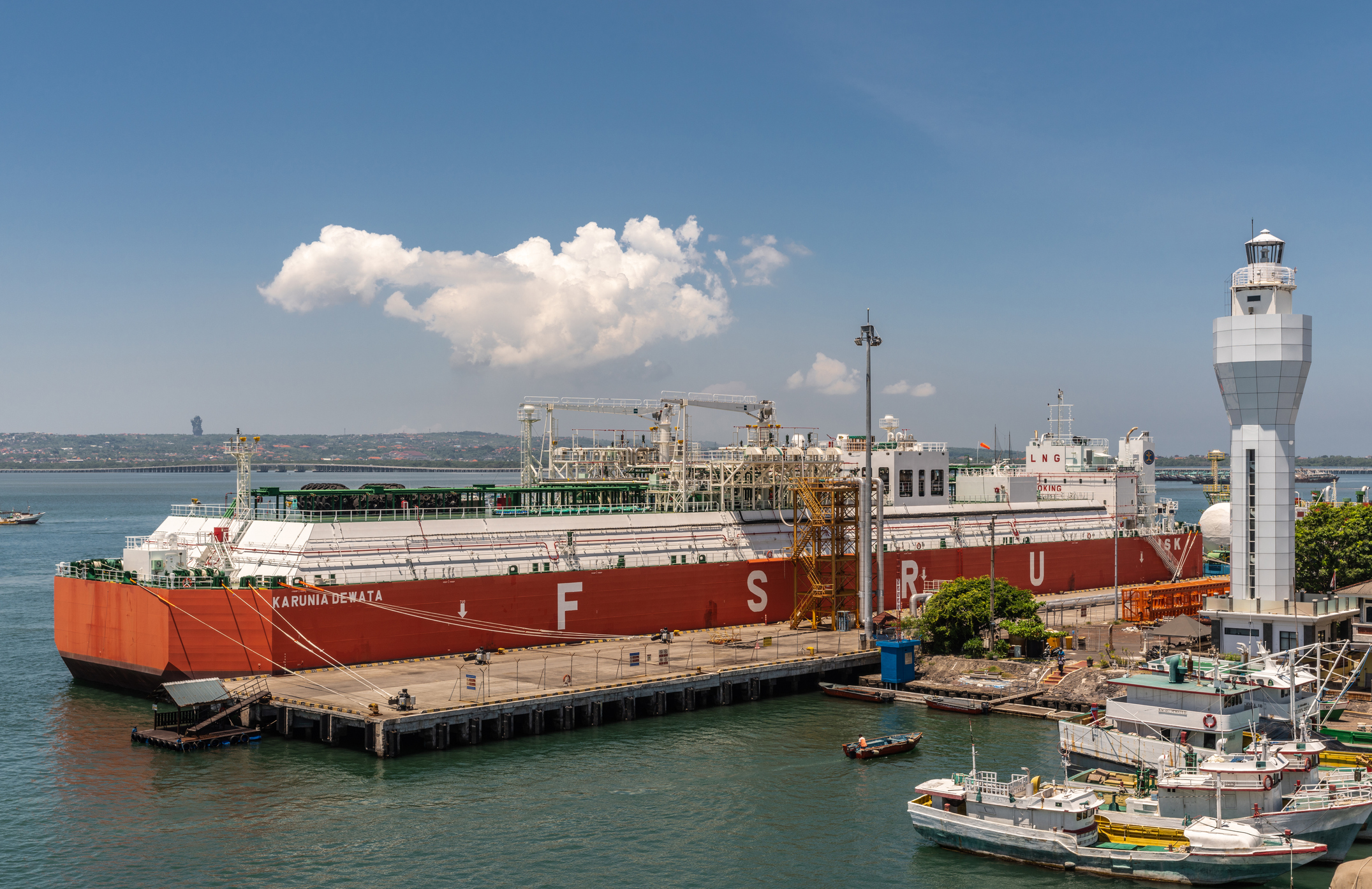 FSRU in Bali moored to quay under blue sky