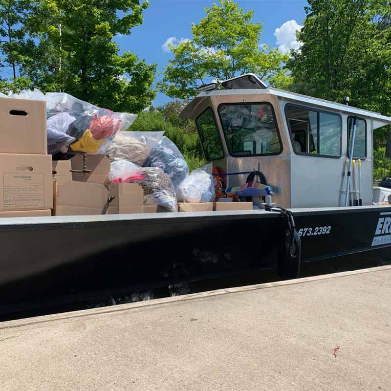 Boat loaded with boxes ready for transit on Stoney Lake