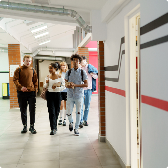 Student Walking in a Hall - Assistments - Formative Assessment Solutions