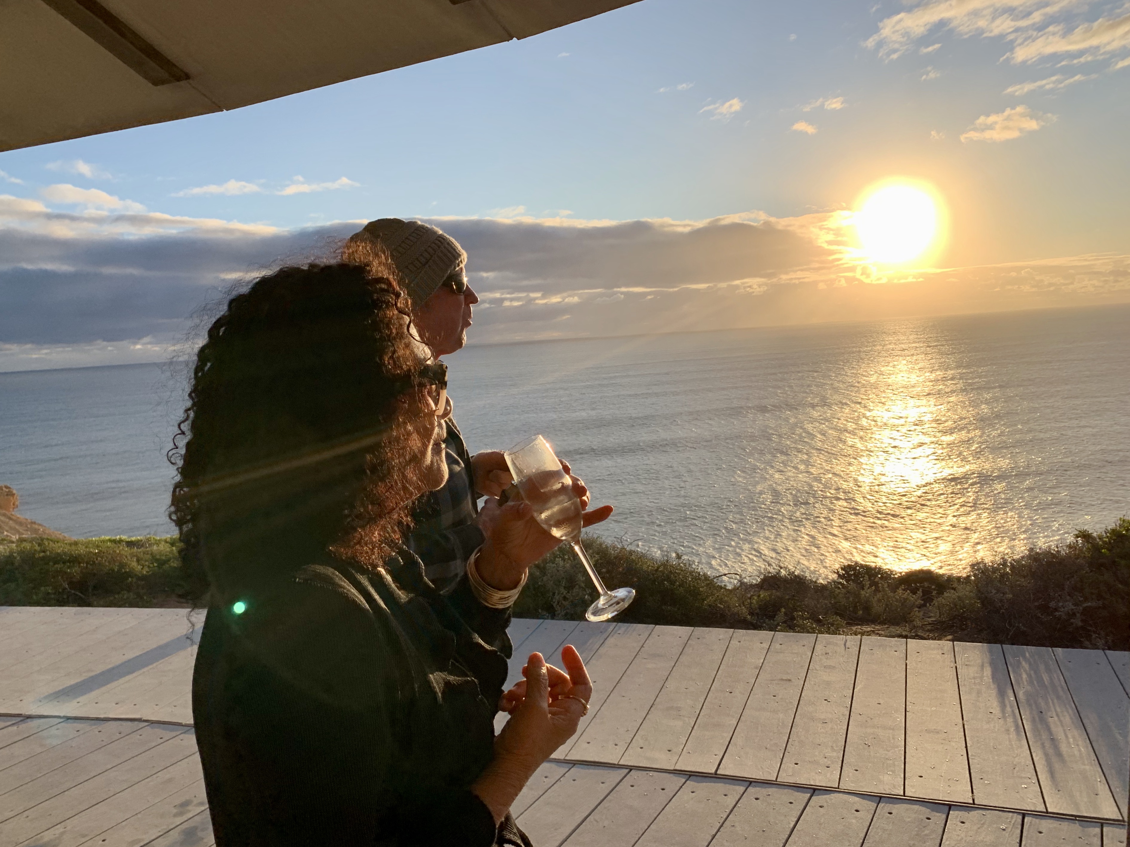 Couple enjoying sunset at Natural Bridge Kalbarri