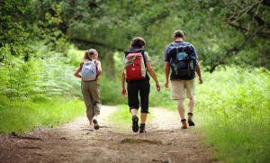 small family on a path