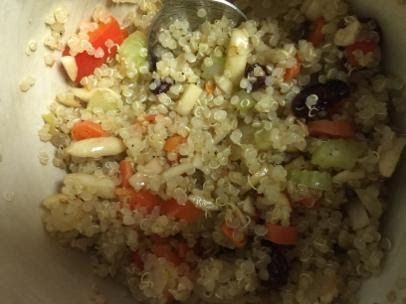 A close up of a plate of food with rice and vegetablesDescription automatically generated
