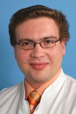 Herr Dr. Baumann