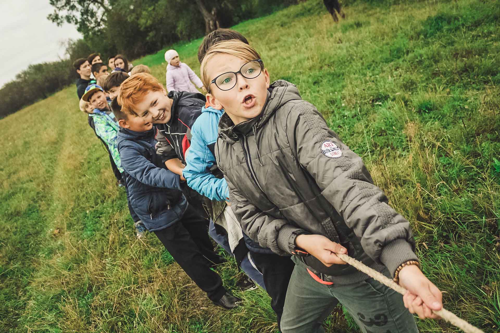 Children having fun in a tug-of-war