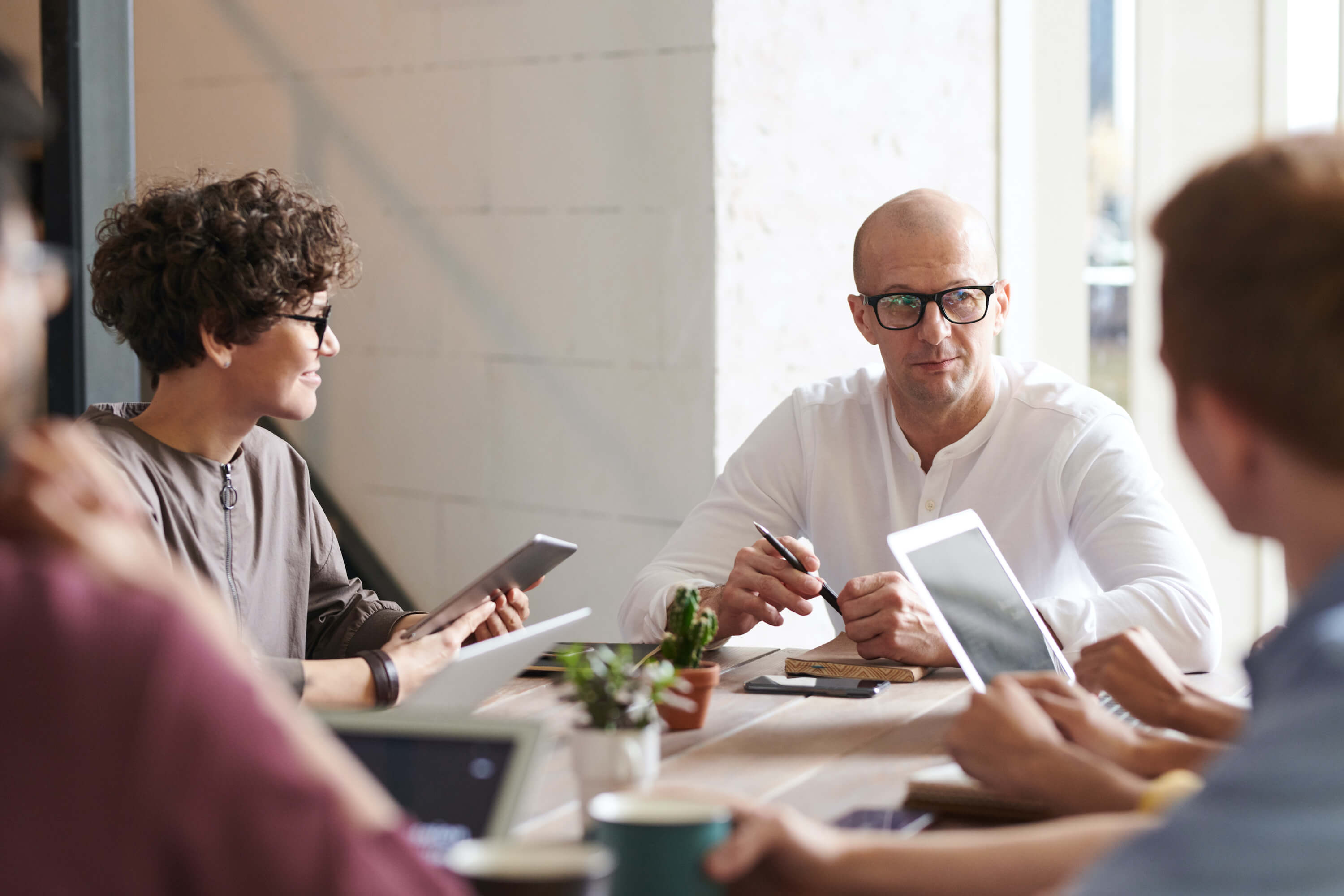 Employees discussing OKR's
