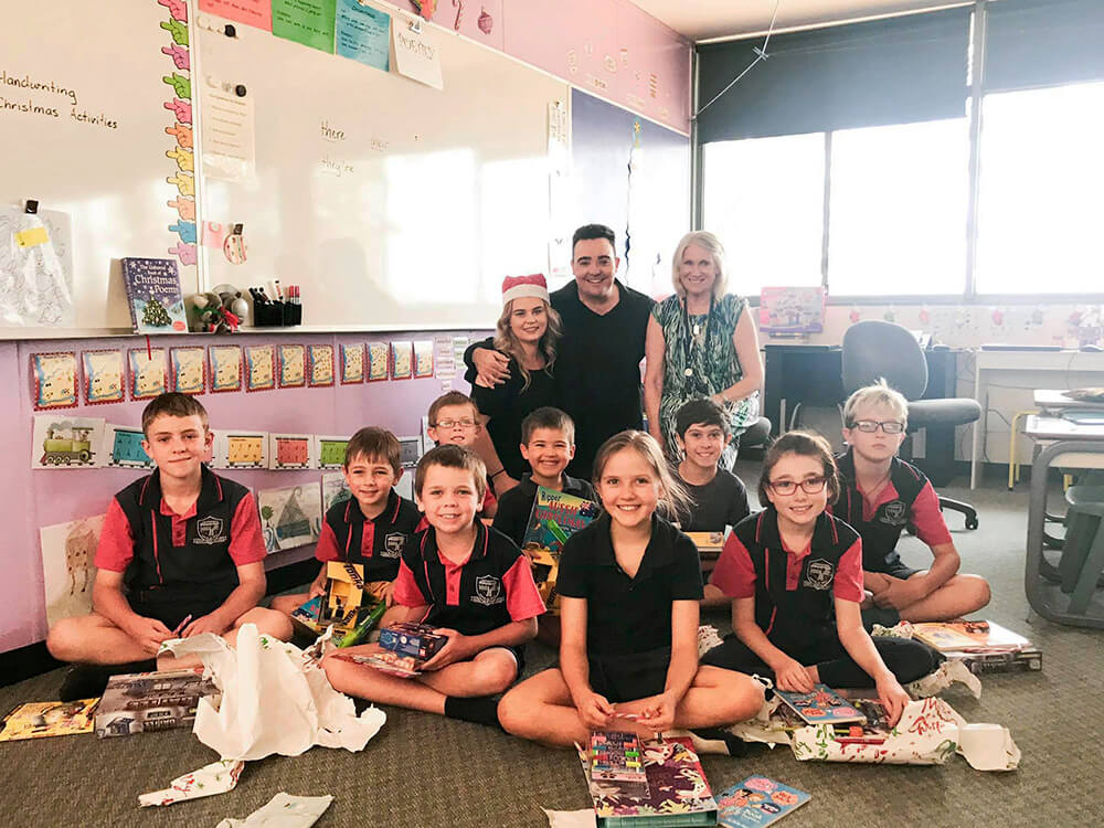 Jason Owen visiting school kids