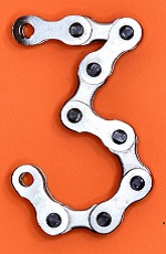 Number 3 formed from bicycle chain links on orange background.