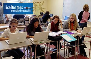 Girls at computer lab - LiceDoctors