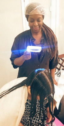LiceDoctors professional technician treating a child
