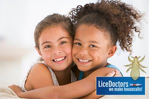 Girlfriends hugging - LiceDoctors