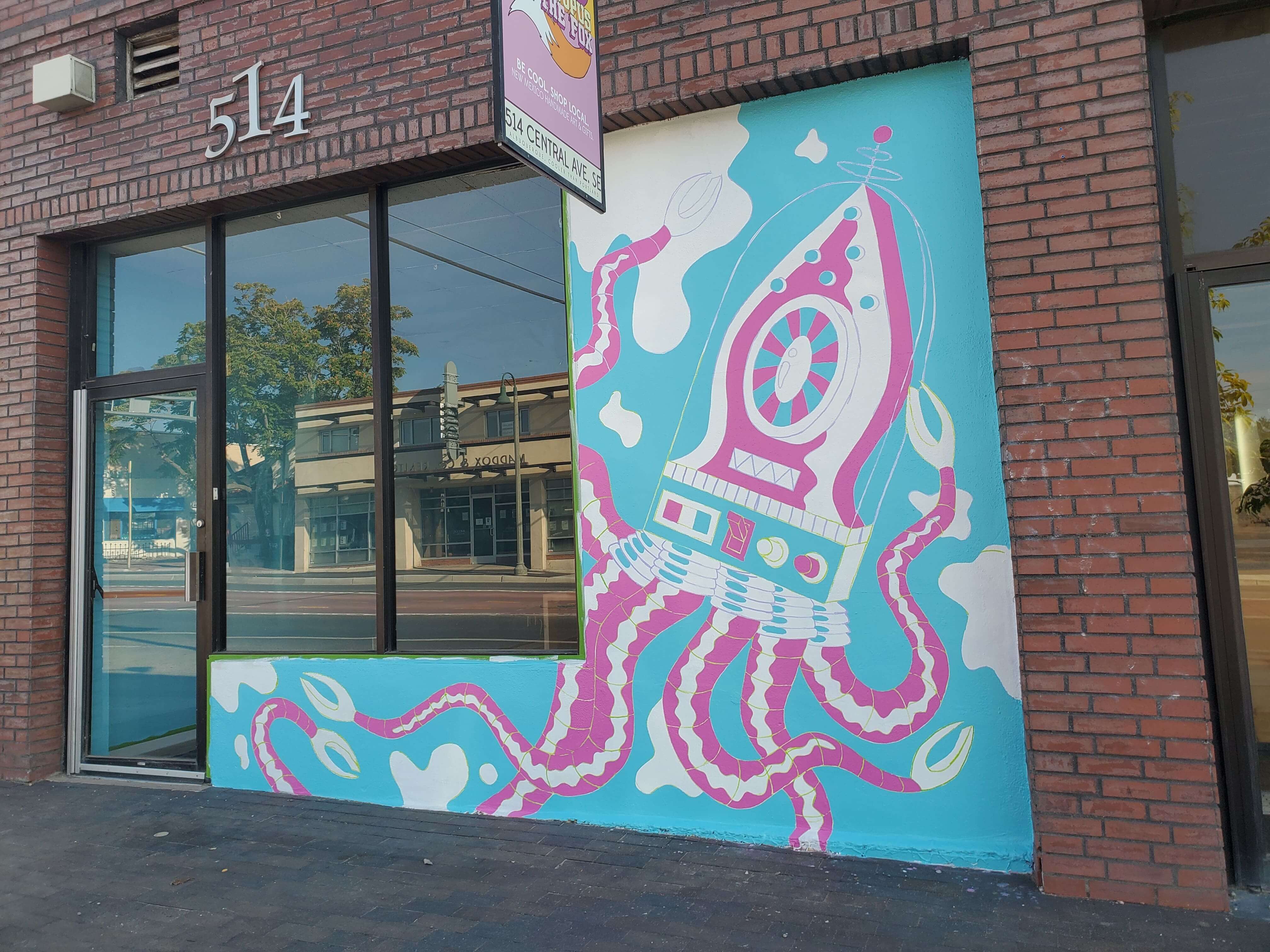 A photo of the Squidly designs mural in progress