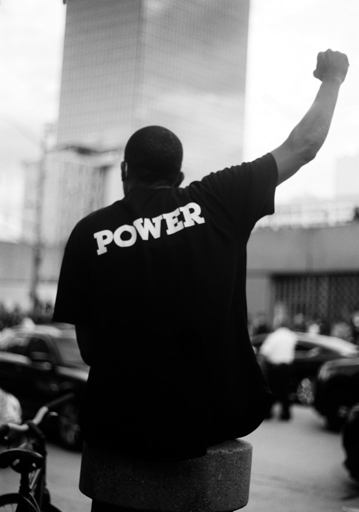 Black power fist during civil rights protest.