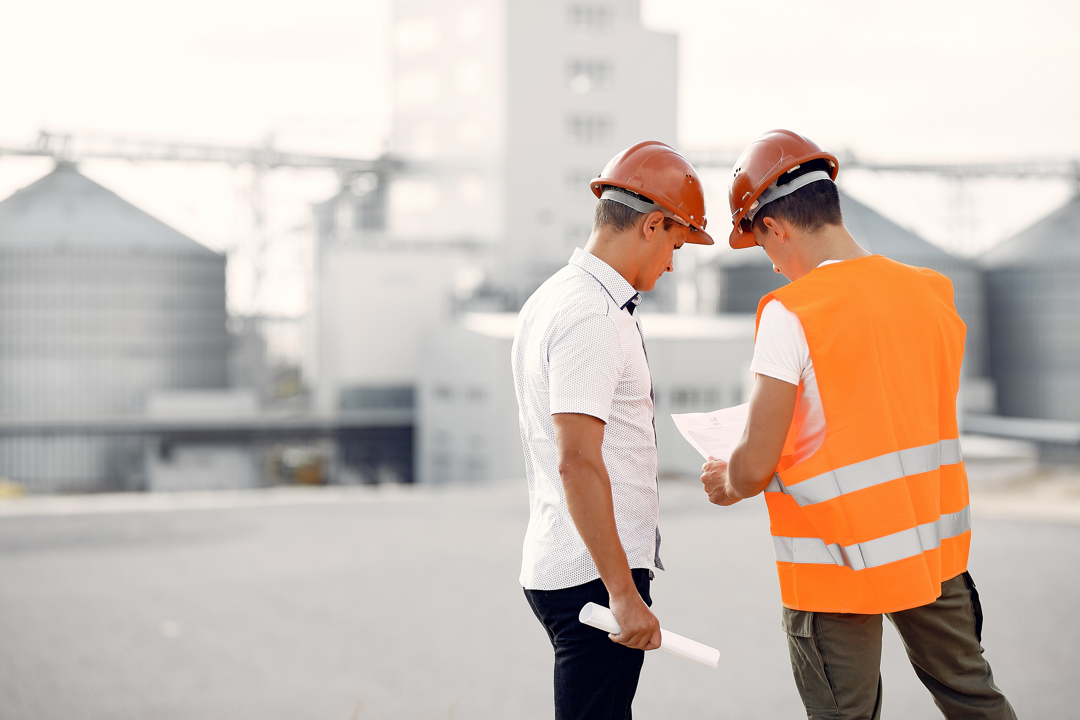 Workers looking at plans