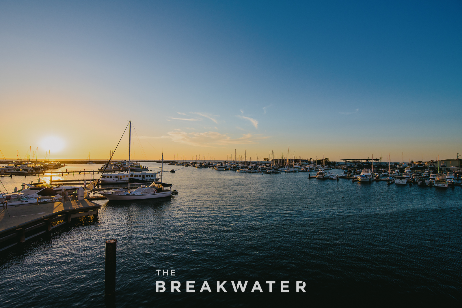 Lots of boats parked at a dock