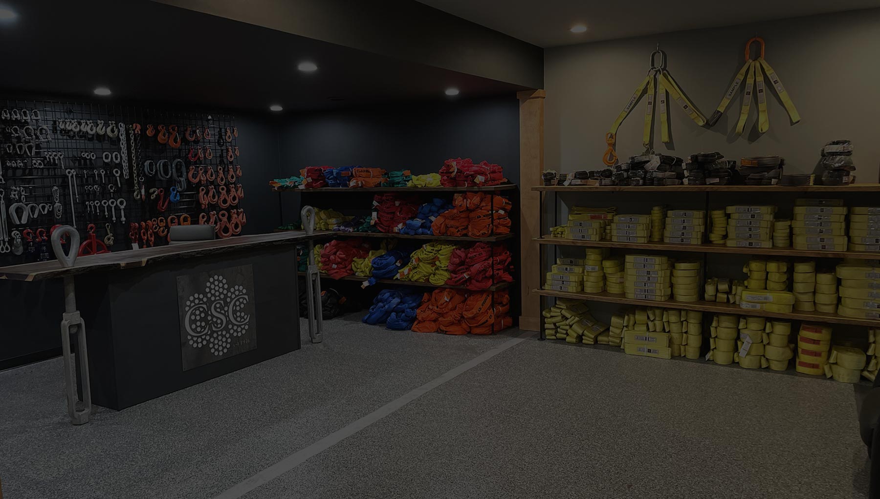 Showroom with chains, hooks, straps, links, and slings