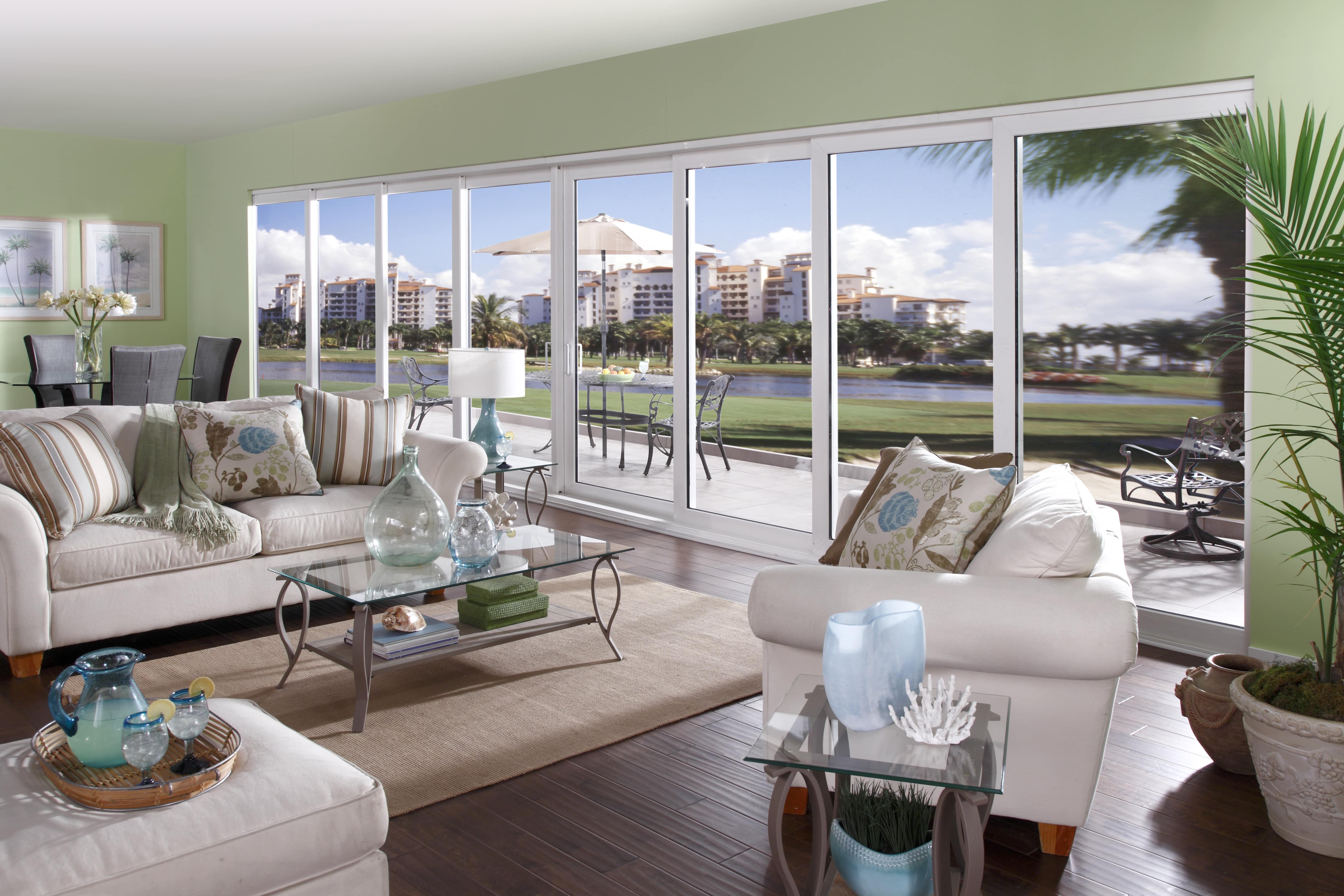 living room with PGT impact sliding glass doors