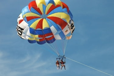 Couple doing parasail