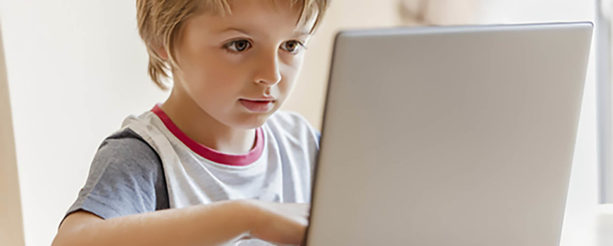 Kid using laptop