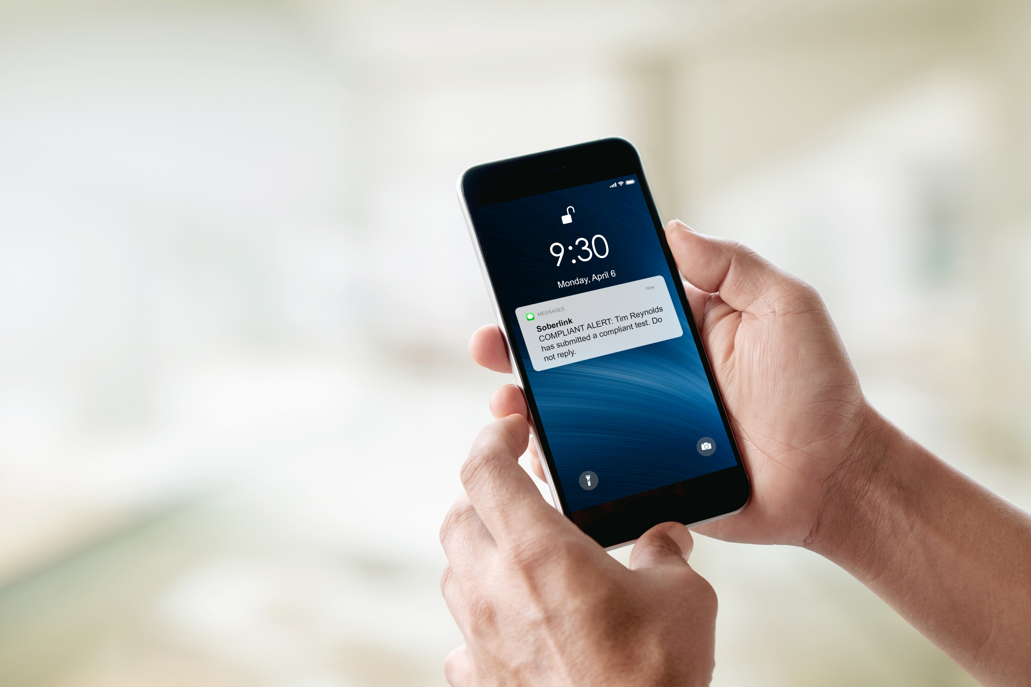 Person reviewing Soberlink Compliant Test alert