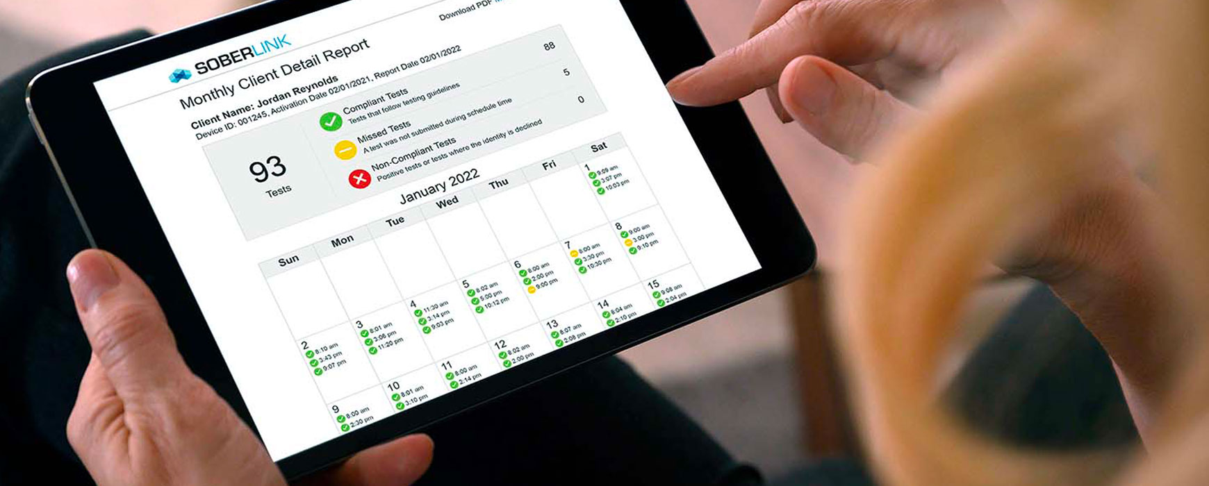 A man using the Soberlink report as an accountability tool