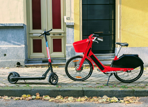 Electric bike and scooter showing micromobility in dense areas