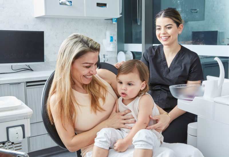 Mum at the dentist with her baby