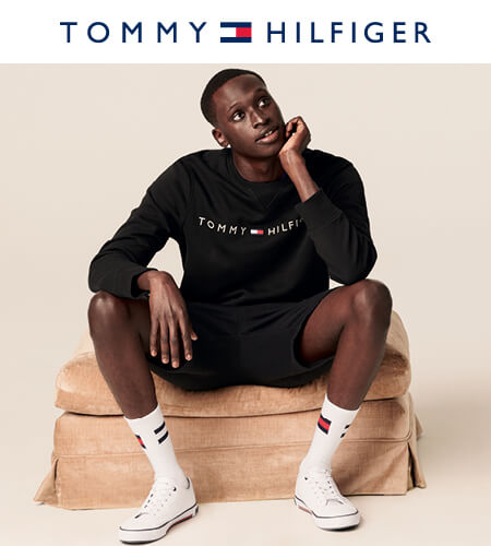 Young man wearing casual Tommy Hilfiger apparel