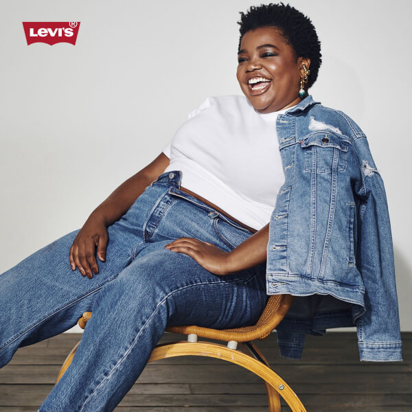 Model wearing Levi's white tee and denim jeans and jacket