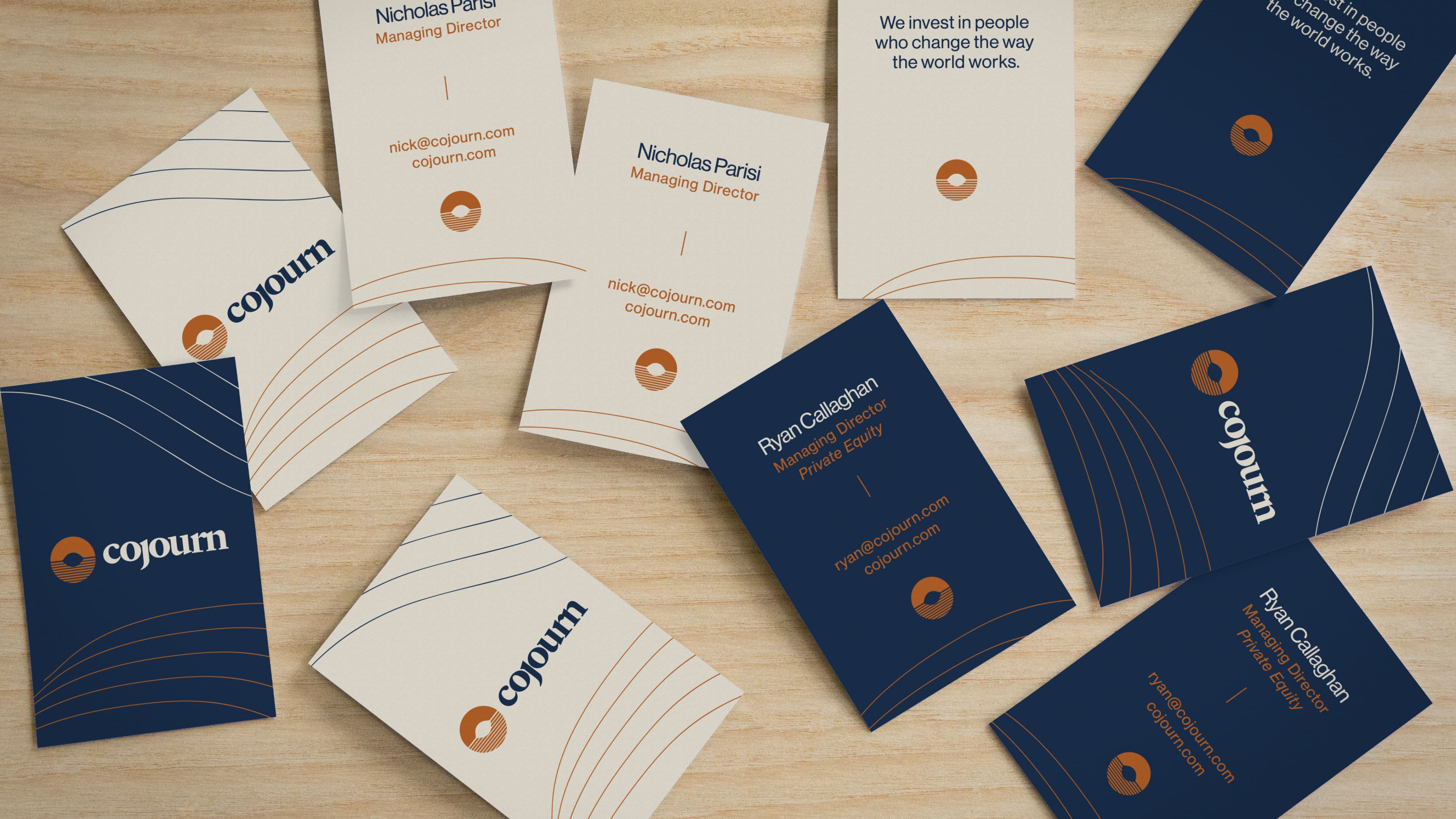 Mockup showing the Cojourn logo on a business card.