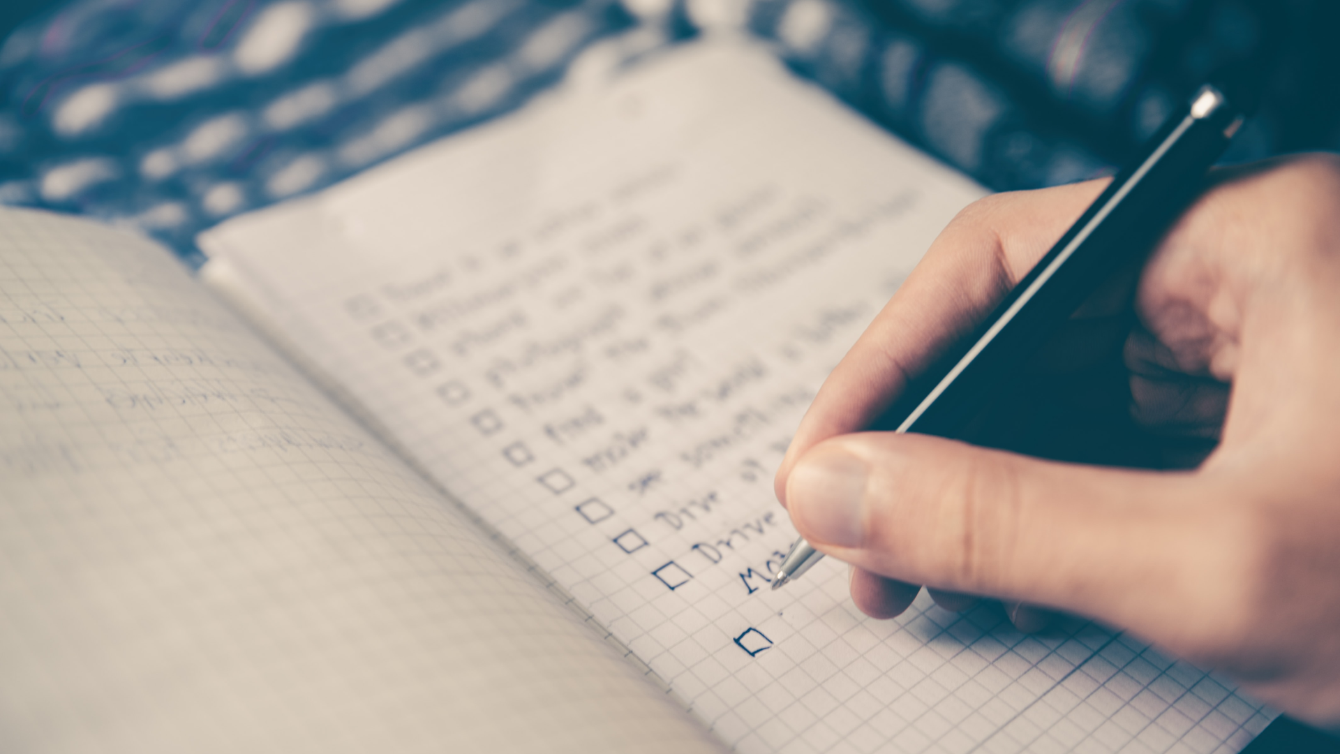 Close-up of an API product manager making a to-do list.