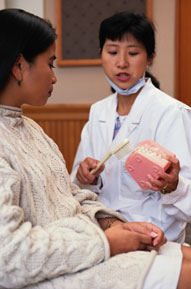 Dentist explaining the root planing procedure