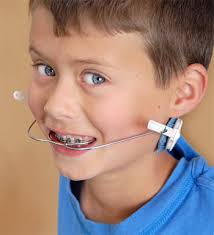 Boy with braces and headgear