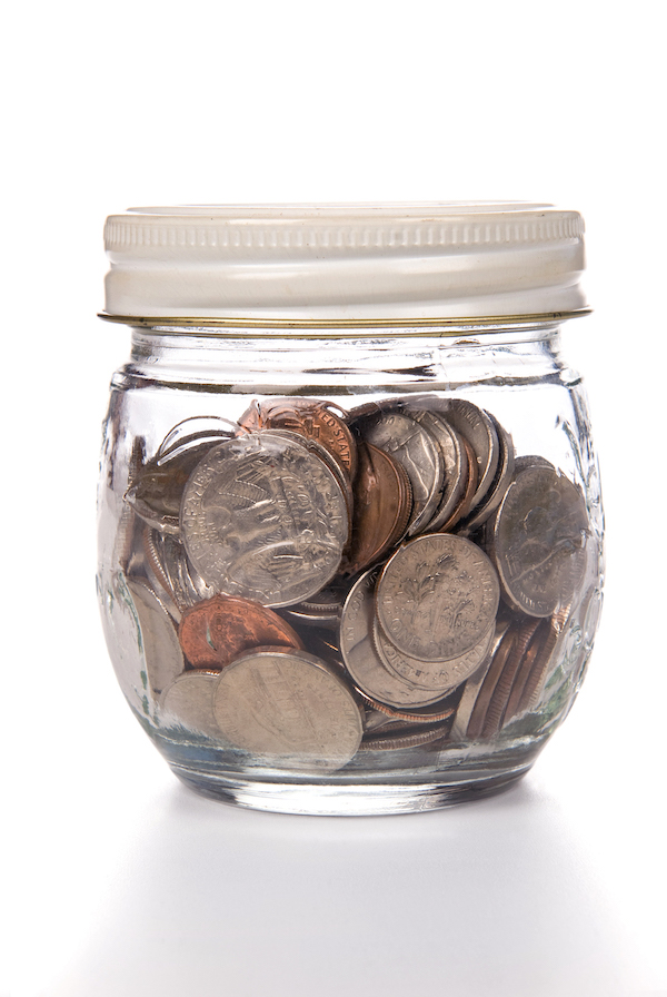 a jar full of american coins
