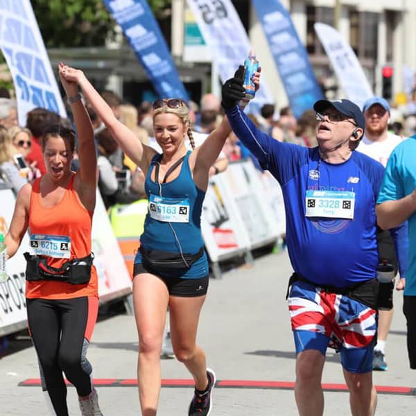 runners crossing the finish line