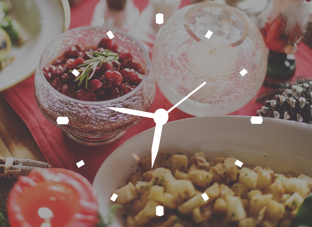 Holiday meal with a clock graphic overlaid