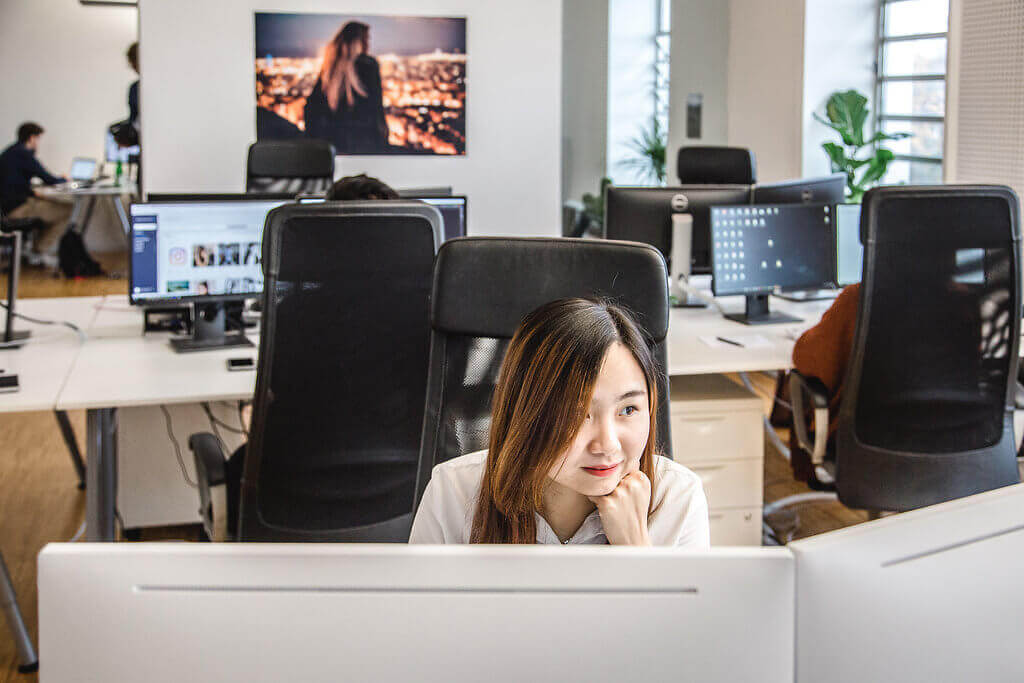 Team members working at the office