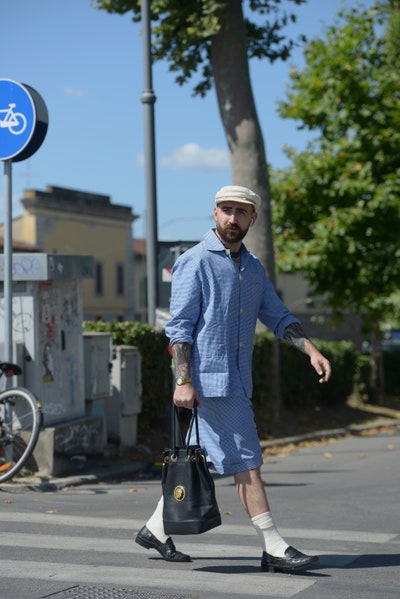 Image may contain Bag Handbag Accessories Accessory Human Person Clothing Apparel Vehicle and Transportation