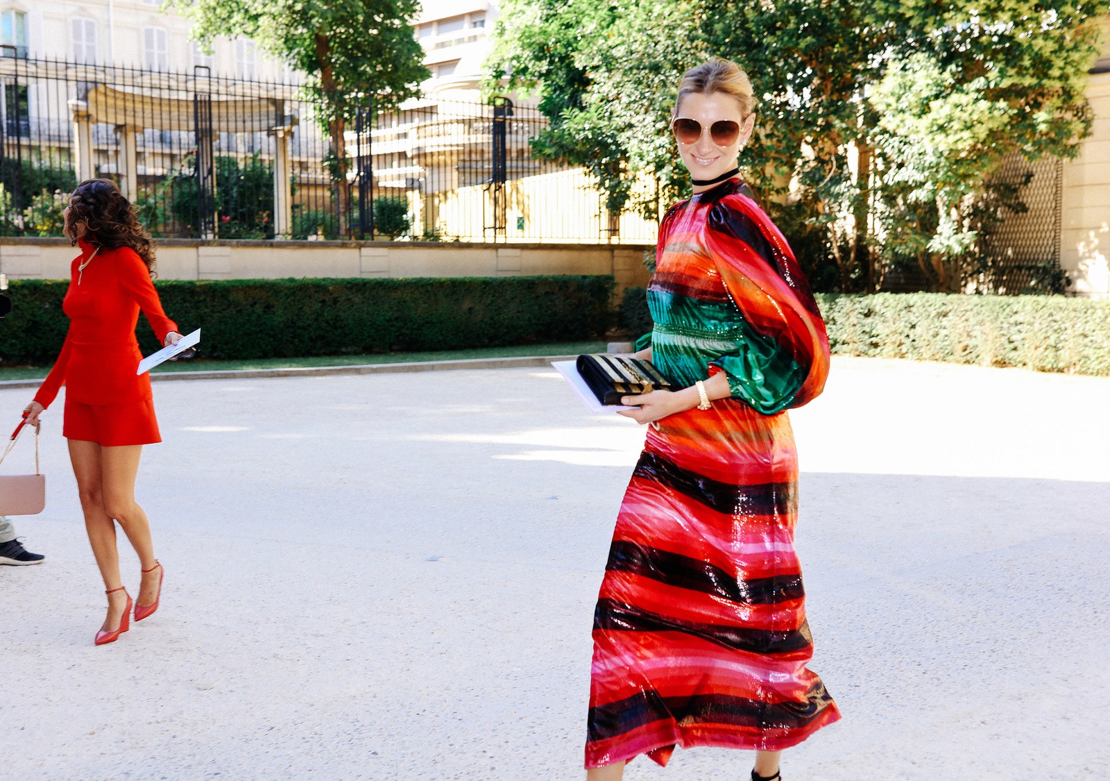 Image may contain Clothing Apparel Human Person Sunglasses Accessories Accessory Dress Female Outdoors and Tree