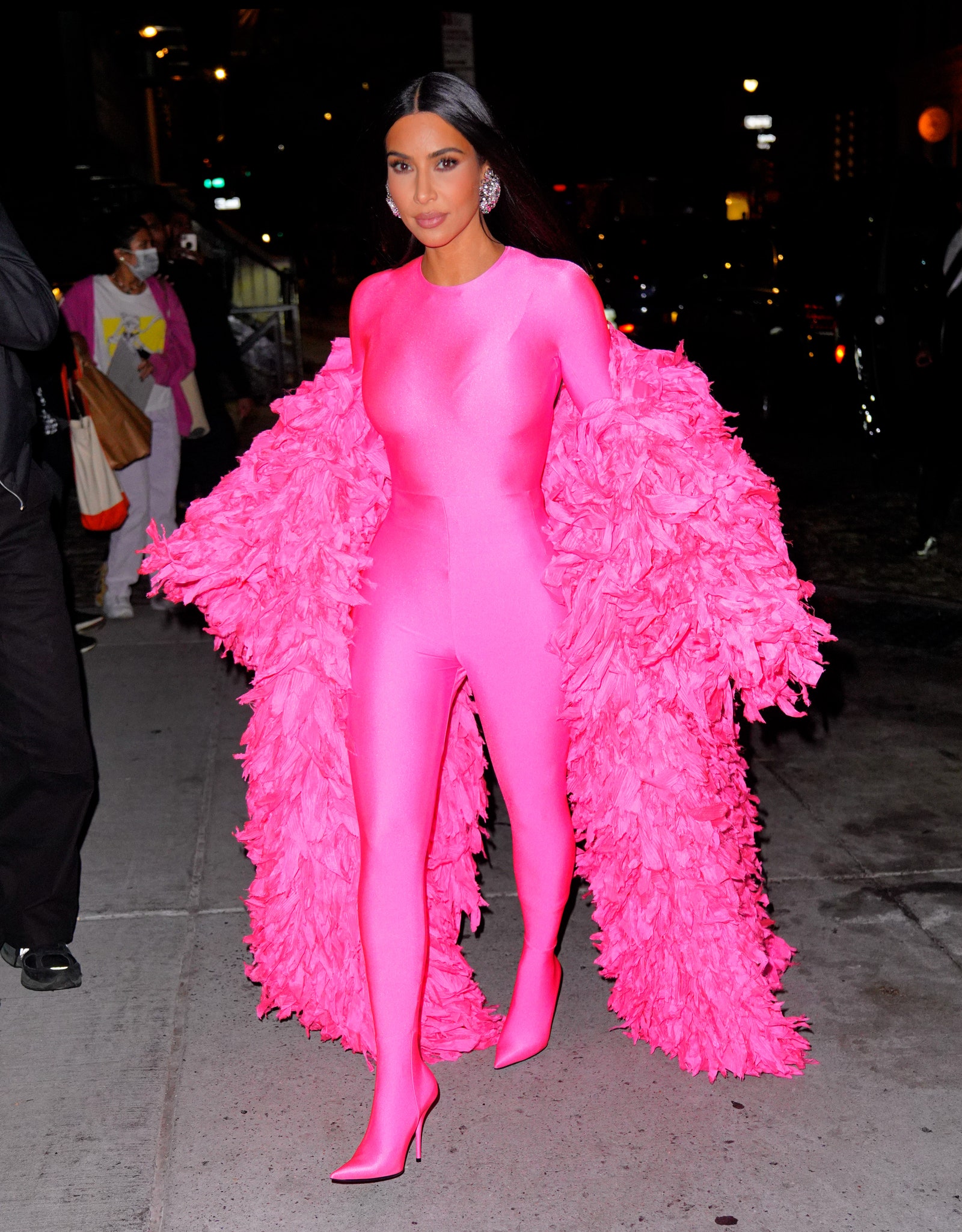 Image may contain Clothing Apparel Human Person Huda Kattan Scarf Madhuri Mehta and Costume