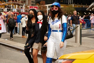 Image may contain Human Person Sunglasses Accessories Accessory Clothing Apparel Footwear and Shoe