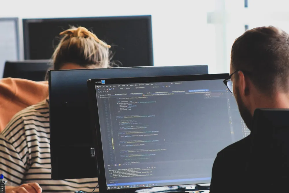 People are working on computers.