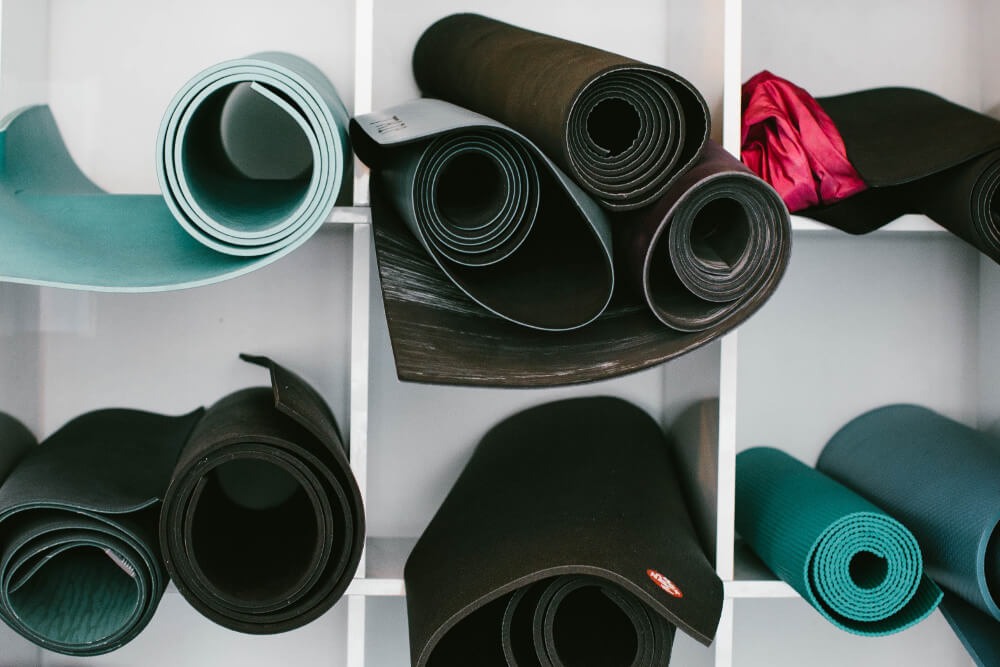 workout equipment like yoga mats - employee breakroom idea