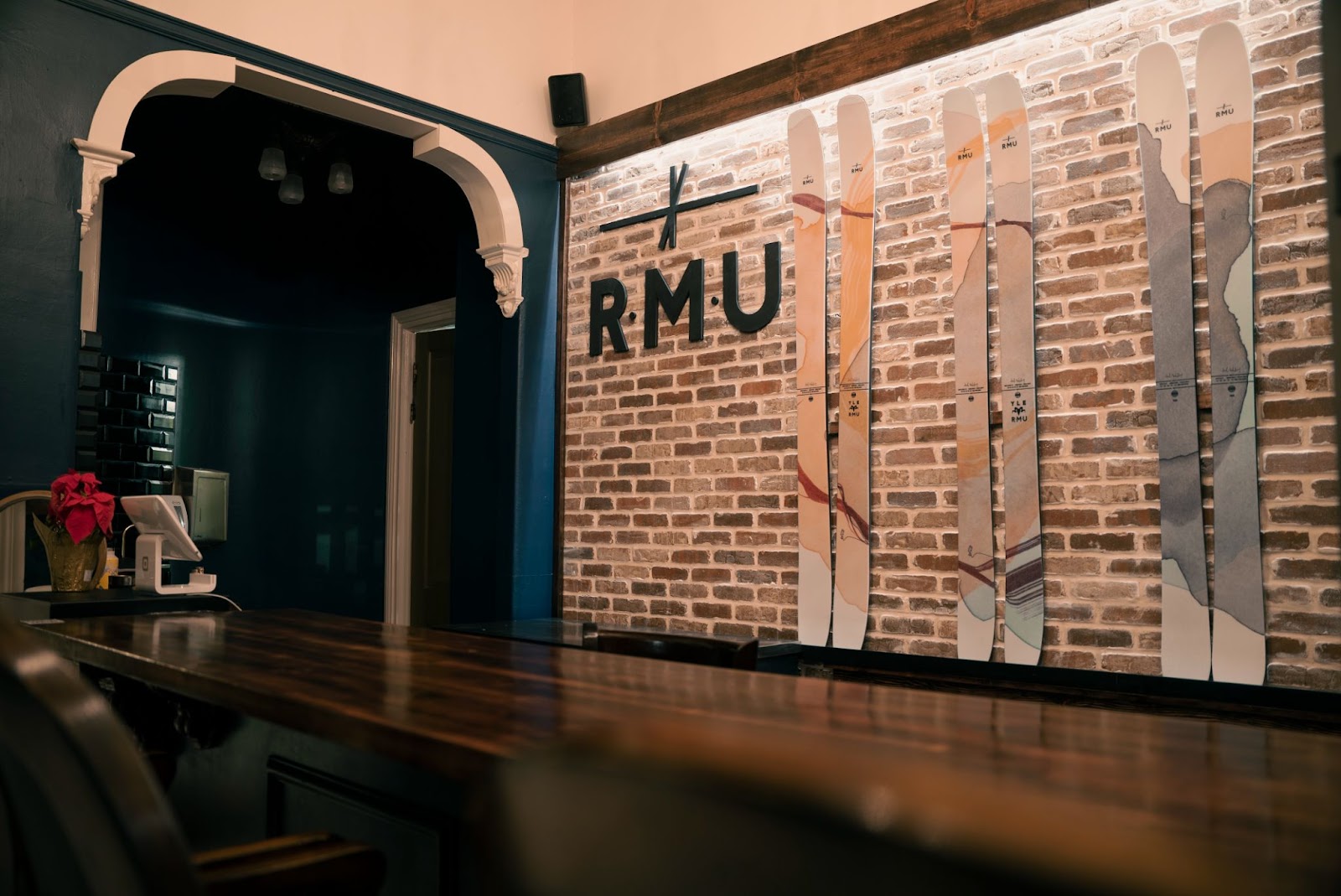 RMU Truckee bar and handcrafted skis on the wall.