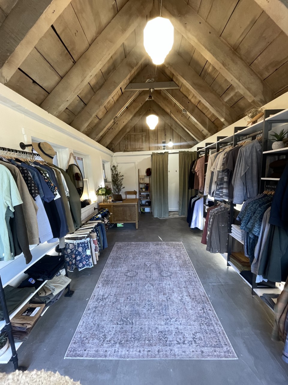 Inside Grizzly Menswear showing mens clothing and accessories.