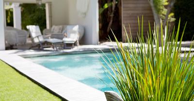 Hardscape Ideas Around Pools | GroveGypsy